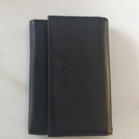 Calvin Klein Handbags - NWOT Calvin Klein black leather wallet
